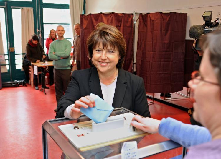 France's socialist leader Martine Aubry casts her vote in the regional elections on March 14, in Lille. France started voting last Sunday in regional polls forecast to punish President Nicolas Sarkozy's ruling party.  (Denis Charlet/AFP/Getty Images)