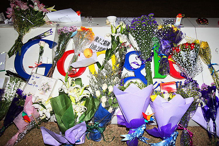 Flowers on the Google logo at its China headquarters in 2010