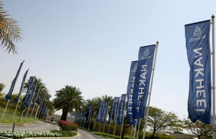 A motorcyclist enters the premises of Emirati property developers Nakheel in Dubai on March 25, 2010.  (Karim Sahib/AFP/Getty Images)