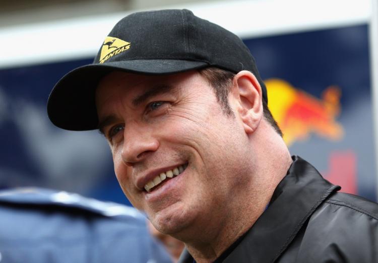 Actor John Travolta walks in the paddock before qualifying for the Australian Formula One Grand Prix at the Albert Park Circuit on Mar. 27, 2010 in Melbourne, Australia. (Ryan Pierse/Getty Images)