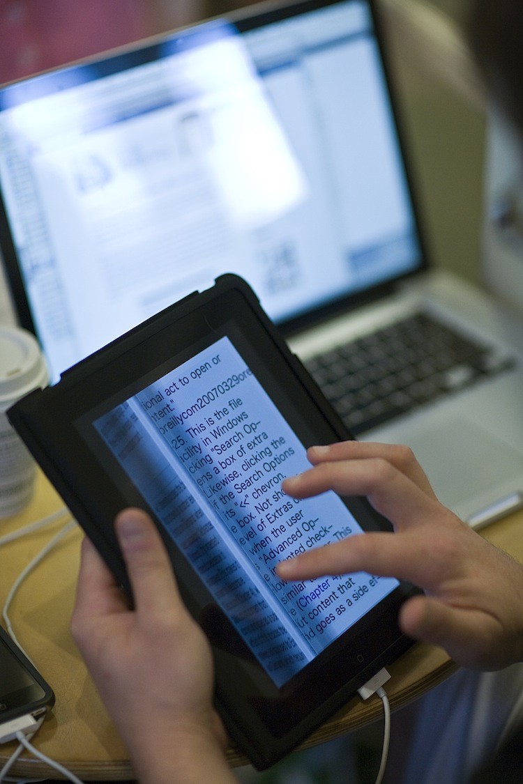 A student from Texas learns to use his newly purchased iPad in 2010. A new report says that many high school students may not be as proficient with technology as they should.   (Tom Pennington/Getty Images)