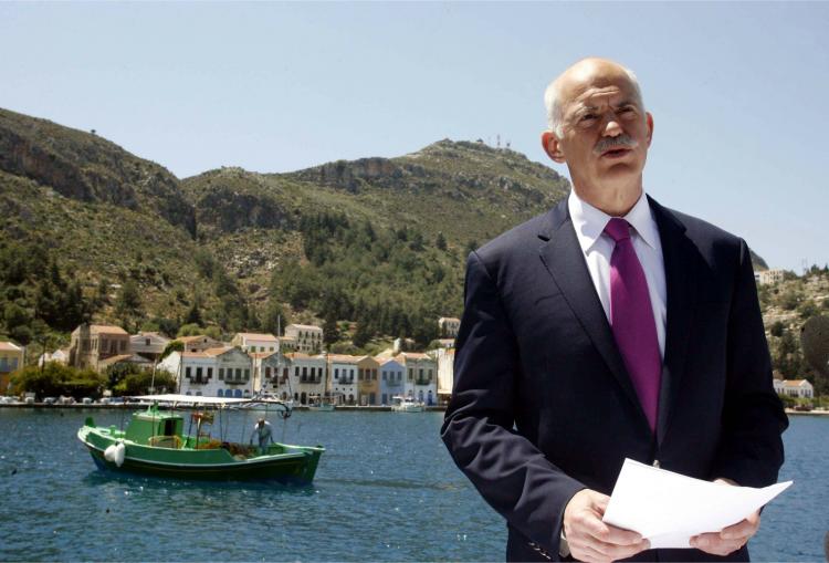 Greek Prime Minister George Papandreou speaks to the media on the island of Kastelorizo, southeastern Greece on April 23. (Tatiana Bolari/AFP/Getty Images)