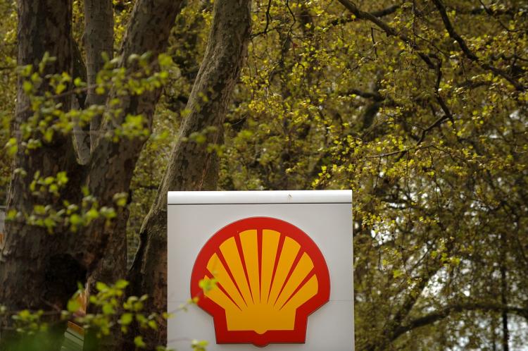 SETTLED: A Shell gas station logo is pictured in London, England. The British energy firm is one of seven companies that settled this week with U.S. authorities on allegations of foreign bribery.