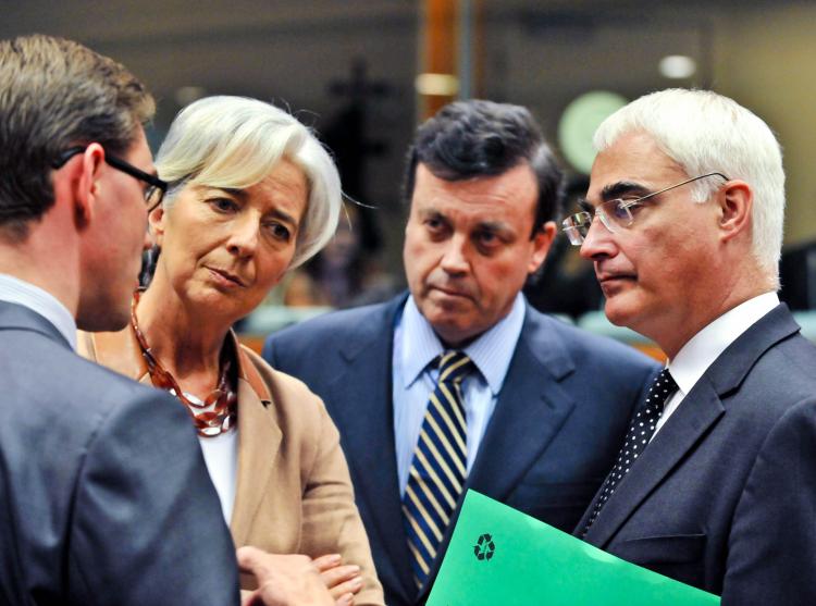 EU TALKS: European Union Finance Ministers talk before the EU Economy and Finance Council meeting on May 9 at EU headquarters in Brussels. L to R Finnish FM Jyrki Katainen, French FM Christine Lagarde, Irish FM Brian Lenihan, and British FM Alistair Darling (Georges Gobet/AFP/Getty Images)