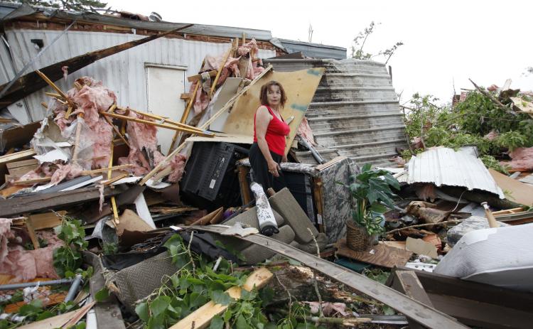 Linda King, 61, stands in the debris of the trailer home she had not yet finished moving into in Slaughterville, Oklahoma, after the Oklahoma tornado. (Brett Deering/Getty Images)