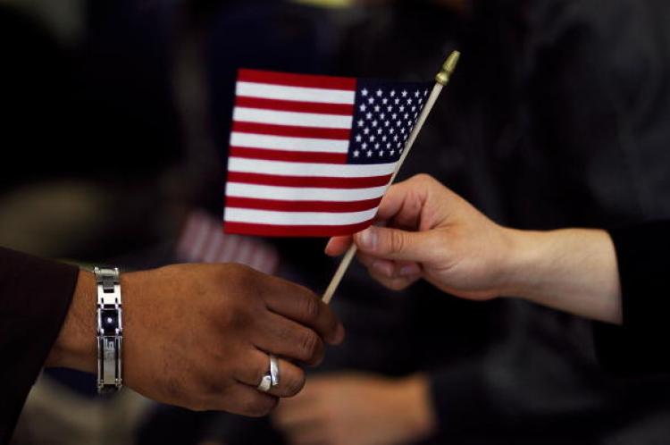 At a naturalization ceremony at a U.S. Citizenship and Immigration Services office in New York City. (Chris Hondros/Getty Images)
