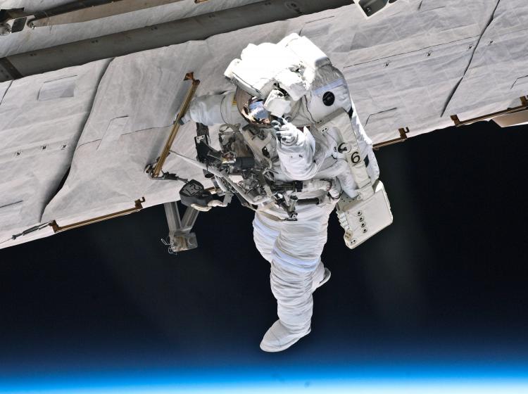 NASA astronaut Garrett Reisman, STS-132 mission specialist, participates in the mission's first session of extravehicular activity (EVA) as construction and maintenance continue on the International Space Station on May 17, 2010 in space. (NASA via Getty Images)