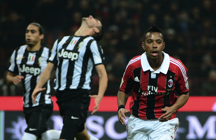 AC Milan's Robinho (R) celebrates after scoring from the penalty spot against Juventus in Sunday's Serie A action at the San Siro in Milan.(Olivier Morin/AFP/Getty Images)