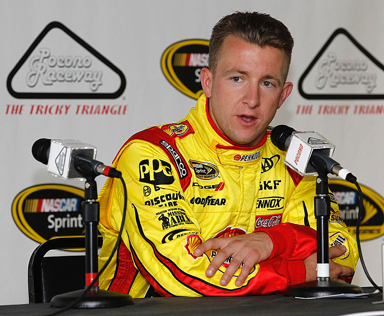 AJ Allmendinger speaks to reporters  at Pocono Raceway on June 7, 2012. (Jeff Zelevansky/Getty Images for NASCAR)