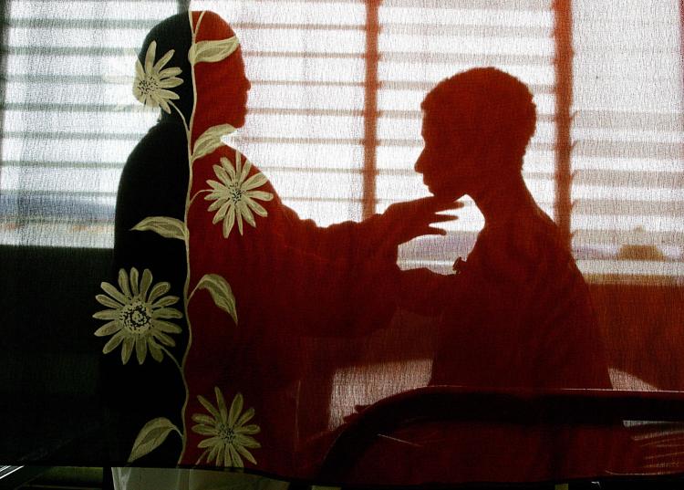 A Papua New Guinea woman (R) is being counselled by a nurse after contracting AIDS from her husband. (Torsten Blackwood/AFP/Getty Images) A Papua New Guinea woman (R) is being counselled by a nurse after contracting AIDS from her husband. (Torsten Blackwood/AFP/Getty Images)