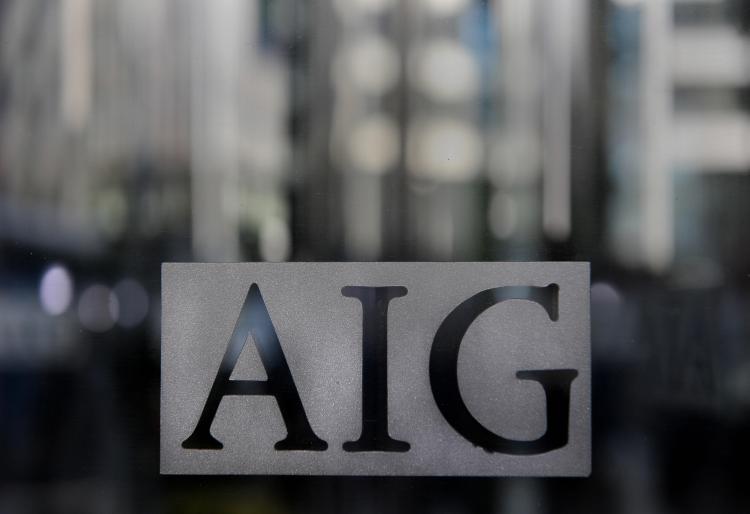 American International Group Inc., (AIG) the New York-based insurance giant, has raised around $37 billion in order to repay the U.S. government, which it owes around $100 billion in debt.  (Stan Honda/Getty Images)
