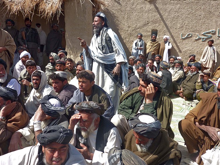 Afghan men gather for a service ceremony at Mohammad mosque