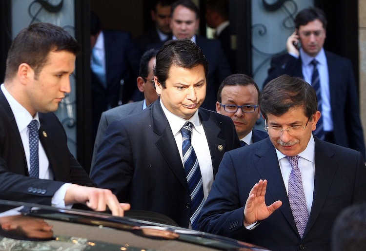 Turkey's Foreign Minister Ahmet Davutoglu (R) leaves a meeting about Syria with army generals and other officials in Ankara, June 23. (Adem Altan/AFP/GettyImages)