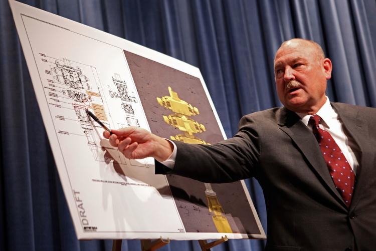 BP Deepwater Horizon oil spill National Incident Commander Retired Coast Guard Adm. Thad Allen points to an illustration of the well cap stack and where leaks have been spotted during a news conference on July 19, in Washington DC.  (Chip Somodevilla/Getty Images)