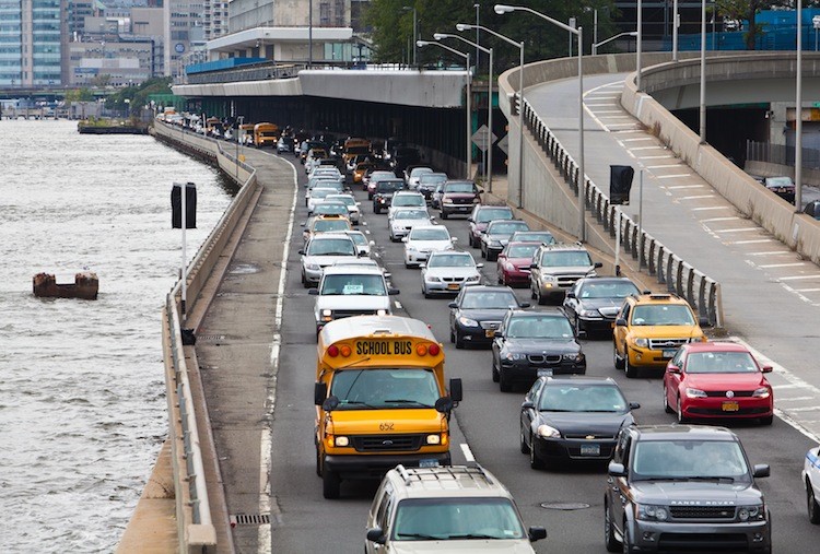 Cars drive on the Franklin Delano Roosevelt Highway near 51st street on Wednesday. (Amal Chen/The Epoch Times)
