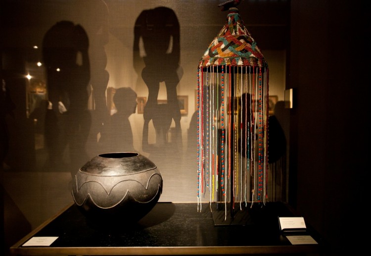 An African vase and a great crown (ade) from Nigeria at the Douglas Dawson Gallery booth. (Amal Chen/The Epoch Times)