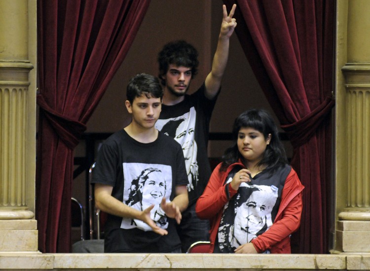 Argentinian youth attend a session of the Chamber of Deputies during the debate for a law that would authorize 16 and 17 year-olds to vote, in Buenos Aires on Oct. 31, 2012. (Hugo Villalobos/AFP/Getty Images) 