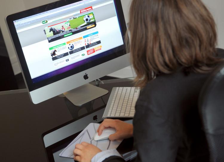 Sitting at a desk with a computer for most of the day, you are probably posturing your body to a forward position in space, shaping it around your keyboard and computer screen.  (Bertrand Langlois/AFP/Getty Images)