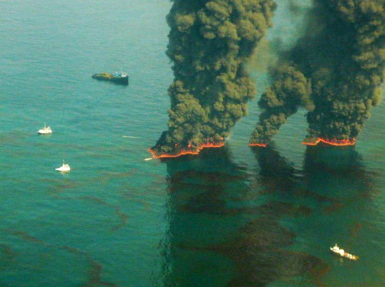 Smoke rises from a controlled burn May 19, in the Gulf of Mexico. Environmental Protection Agency (EPA) has ordered BP to use a less toxic chemical oil dispersant to break up the oil in the Gulf.  (John Kepsimelis/U.S. Coast Guard via Getty Images)