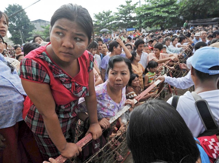 Family members of prisoners wait for their release outside the Insein Central Prison in Yangon on Oct. 12. (Soe Than Win/AFP/Getty Images)