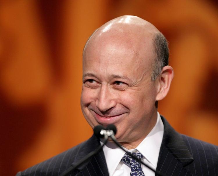 FINANCIAL STRENGTH: Lloyd Blankfein, chairman and CEO at Goldman Sachs speaks to the 2011 CARE Conference in Washington on March 11. Goldman announced that it would repurchase the $5 billion in preferred shares it sold to Warren Buffett's Berkshire Hathaway. (Chris Kleponis/AFP/Getty Images)