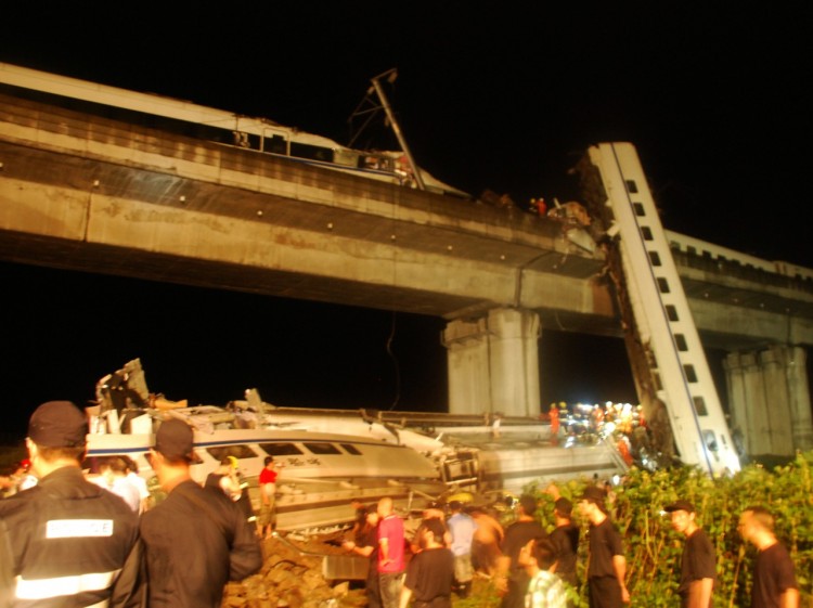 Firefighters rescue survivors of a high-speed train accident on July 23, 2011, near Wenzhou City, China. (STR/AFP/Getty Images)