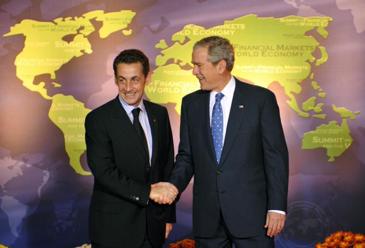 G20 SUMMIT: President George.W Bush (R) welcomes his French counterpart Nicolas Sarkozy (L) at the G20 summit at the National Building Museum on Nov. 15 in Washington, D.C. (ERIC FEFERBERG/AFP/Getty Images)