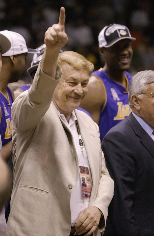 Dr. Buss celebrates after game four