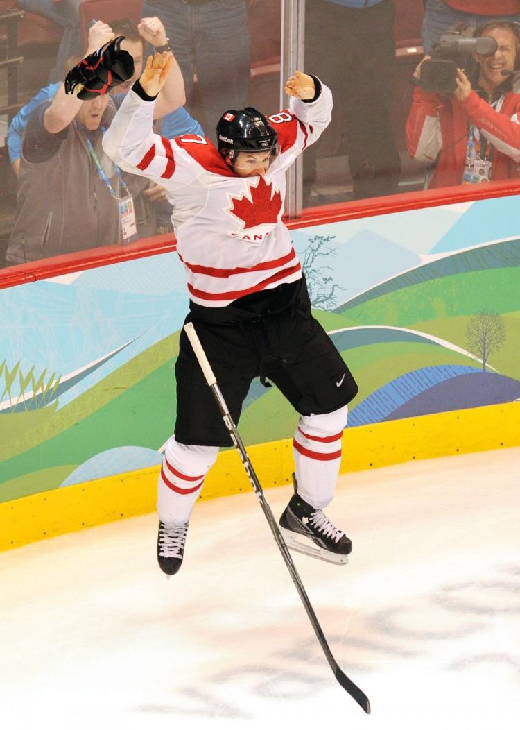 Canadian forward Sidney Crosby celebrates as Canada's team wins gold at the Winter Olympic Games in Vancouver, Canada on Feb. 28. Reebok Canada has offered US$9,730 for Crosby's stick and one glove which went missing after the game.  (Yuri Kadobnov/AFP/Getty Images)