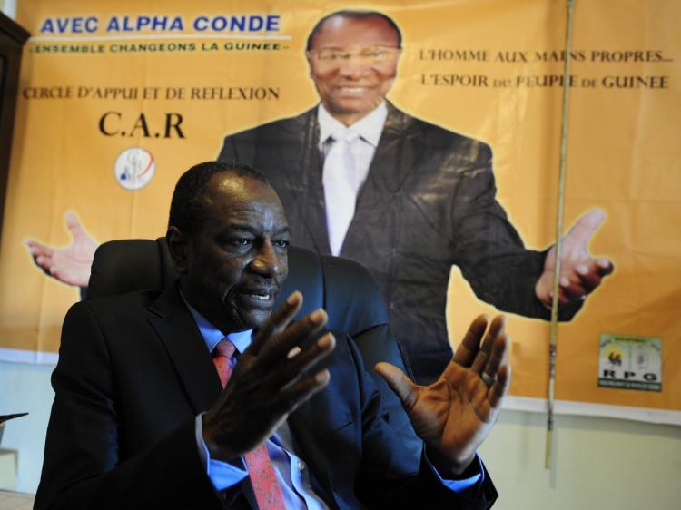VOTE ON HOLD: Alpha Conde, Guinean presidential candidate for the Rally of the Guinean People Party, is photographed on Sept. 16 at party headquarters in Conakry, Guinea. (Issouf Sanogo/AFP/Getty Images)