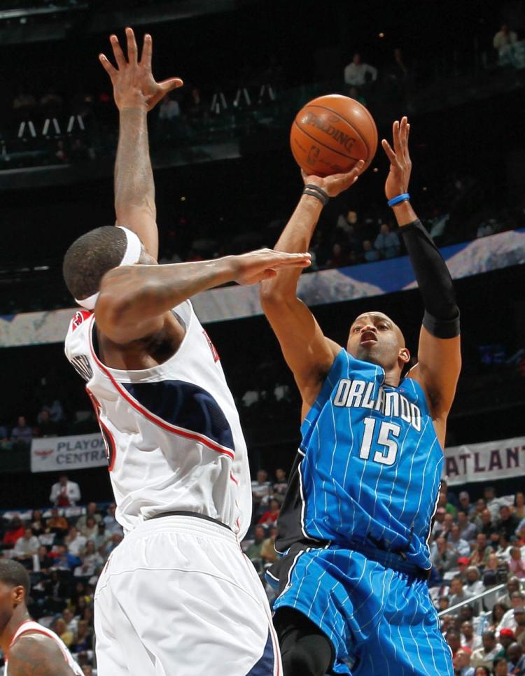 Vince Carter led Orlando to their 98Ã¢ï¿½ï¿½84 victory against the Atlanta Hawks for the series sweep. (Kevin C. Cox/Getty Images)