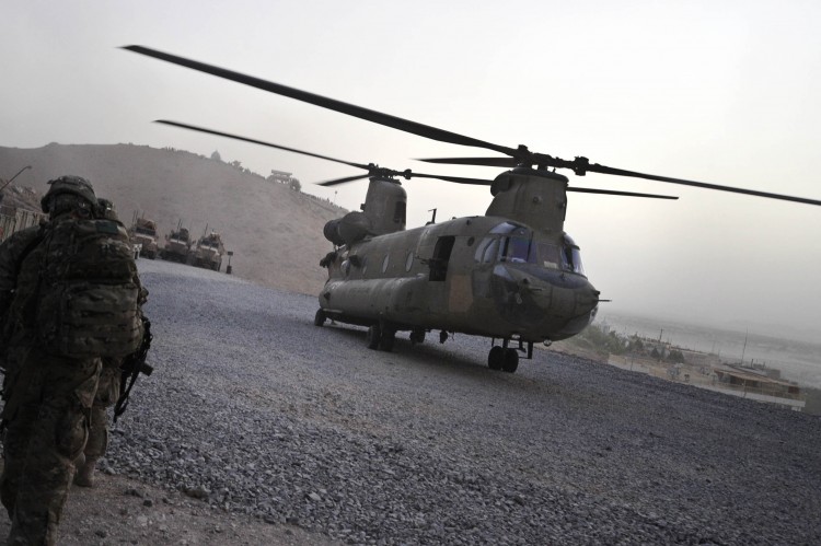 A U.S. military Chinook helicopter is seen landing at Forward Operating Base in Arghandab District in southern Afghanistan on July 29. (Romeo Gacad/AFP/Getty Images)