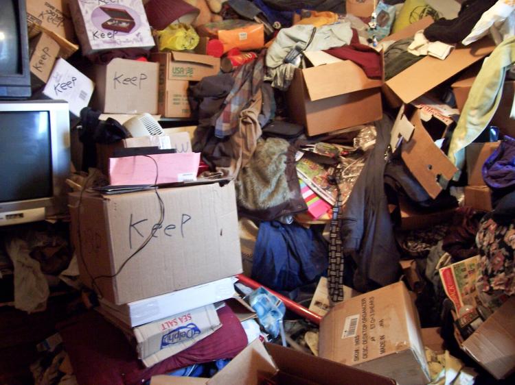 The senior living in this one-bedroom apartment wrote 'keep' on several of the items that she hoarded. Many hoarders seek help only when a crisis, such as a fall, or a rodent or bedbug infestation, forces them into it. (Used with permission)
