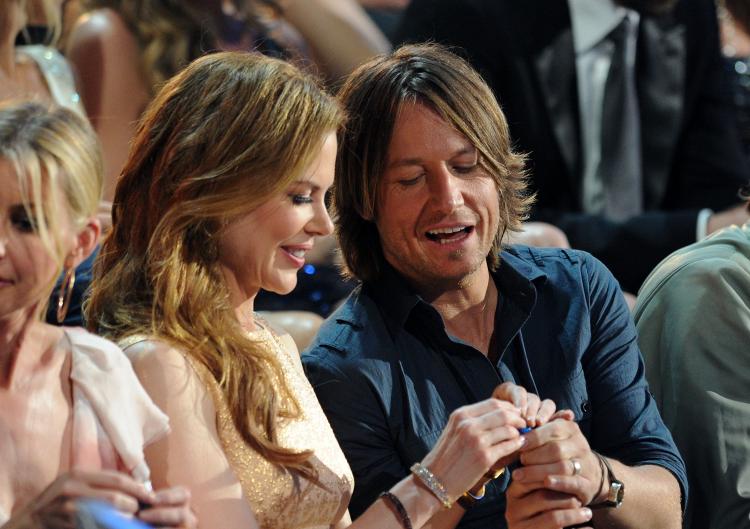 Actress Nicole Kidman with husband, Keith Urban in the audience at the 2010 CMT Music Awards at the Bridgestone Arena on June 9, in Nashville, Tennessee. Keith Urban, was awarded the Male Video of the Year award for his song, 'Til Summer Comes Around.'(Jason Merritt/Getty Images) Actress Nicole Kidman with husband, Keith Urban in the audience at the 2010 CMT Music Awards at the Bridgestone Arena on June 9, in Nashville, Tennessee. Keith Urban, was awarded the Male Video of the Year award for his song, 'Til Summer Comes Around.'(Jason Merritt/Getty Images)