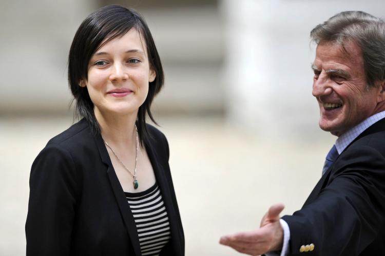 RETURNED HOME: French academic Clotilde Reiss (L) and French Foreign Affairs Minister Bernard Kouchner leave the Elysee Palace in Paris, after being received by French President Nicolas Sarkozy after her return from Teheran, on May 16.  (Lionel Bonaventure/Getty Images )