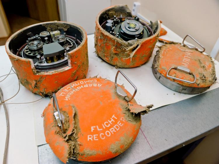 The flight recorders from the plane of Polish President Lech Kaczynski sit on a table at the headquarters of the interstate air committee in Moscow on May 19. The aviation committee investigating the April 10 crash- Poland's worst post-World War II disaster. (Natalia Kolesnikova/AFP/Getty Images)