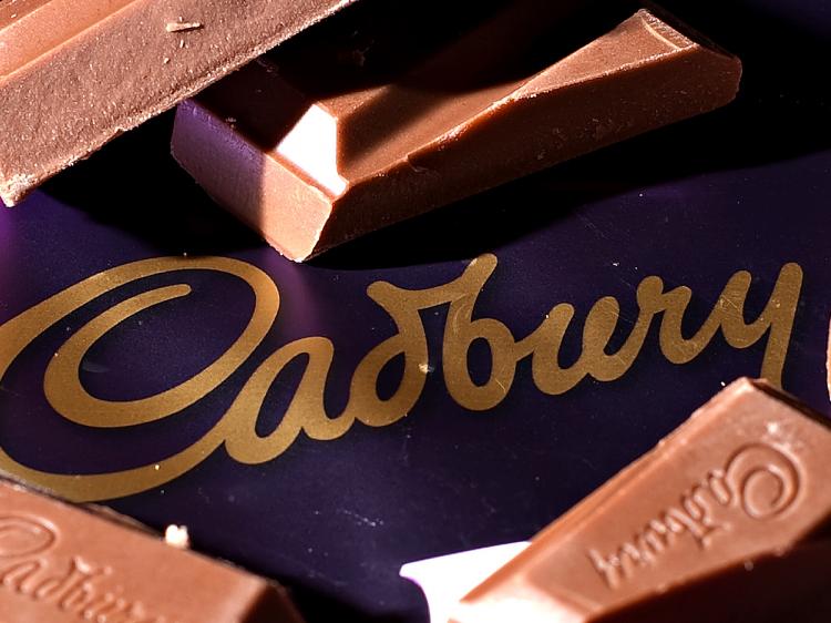 Cadbury's share price is rising as rumors of a bigger offer from Kraft arise. (Leon Neal/AFP/Getty Images )