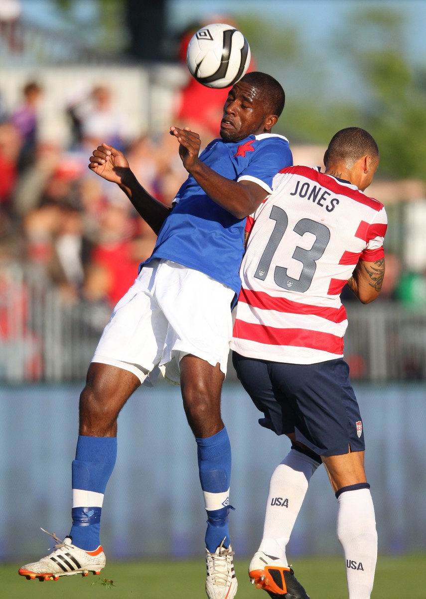 Canada's Olivier Occean (L) competes for a header with US player Jermaine Jones at BMO Field in Toronto Sunday night (Tom Szczerbowski/Getty Images) 