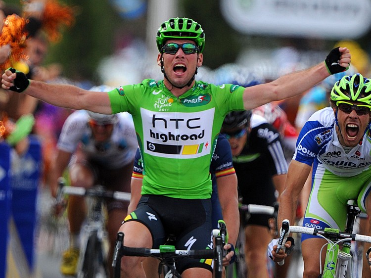 Mark Cavendish (L) celebrates on the finish line as he wins Stage 15 of the 2011 Tour de France. Danial Oss of Liquigas (R) finished fourth. (Pascal Pavani/AFP/Getty Images)