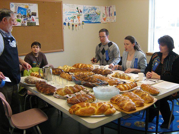 LOVELY LOAVES: Judges choose the best challah. (Lisa Wederspahn/The Epoch Times)