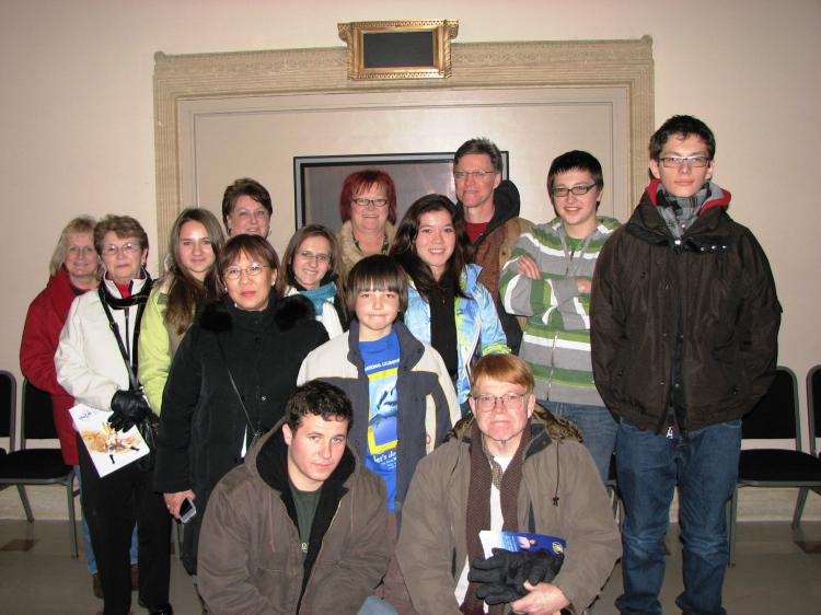 Kneeling, Mr. Buhler (right) and Mr. Gira. Second row (left) Mrs. Buhler (The Epoch Times)