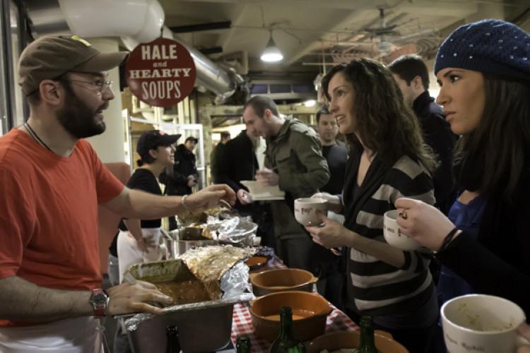 SLOW COOKING: Eder Montero (L) prepared for the New York ChiliFest 2011 competition with his wife Alex Raij in their kitchen at Txikito on Ninth Avenue, between 24th and 25th streets, for two weeks. (Phoebe Zheng/Thew )