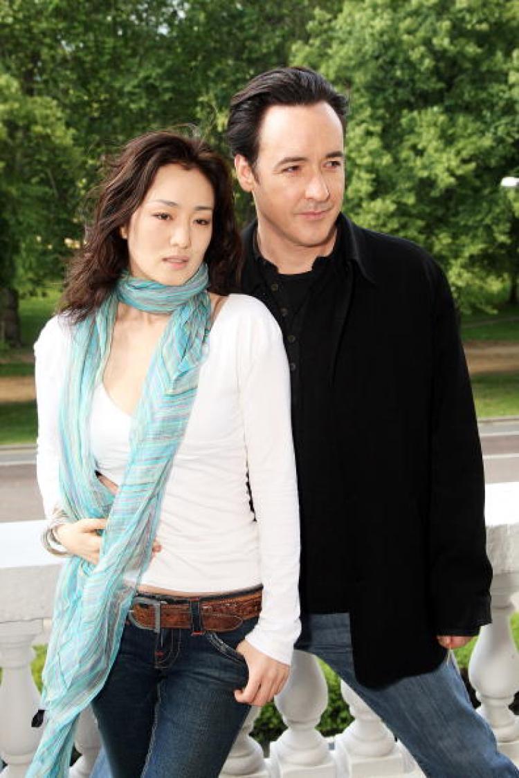 In February 2009, China blocked a Hollywood film 'Shanghai' starring actor John Cusack (R) and actress Gong Li (L) due to concern over its script. The film was about Japan's invasion of China during World War II, a sensitive topic for the regime. (Dave Hogan/Getty Images)