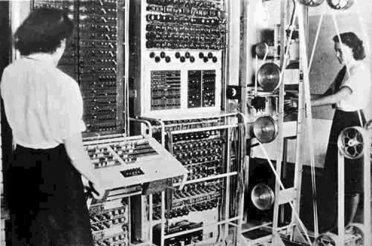 COLOSSUS: The Colossus machine was the first programmable electronic computer and was used to decode German communications during World War II. (United Kingdom Government)