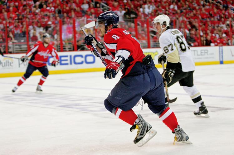 EAGERLY ANTICIPATED DUEL: Alex Ovechkin and Sidney Crosby recorded hat tricks in a highly entertaining Game 2 on Monday night. (Len Redkoles/Getty Images)