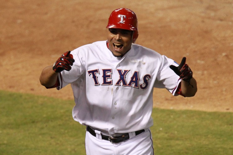 Nelson Cruz of the Texas Rangers celebrates one of his six post season homeruns during Game 6 of the ALCS. Cruz hopes to stay red hot and lead the Rangers to their first World Series title. (Ronald Martinez/Getty Images)