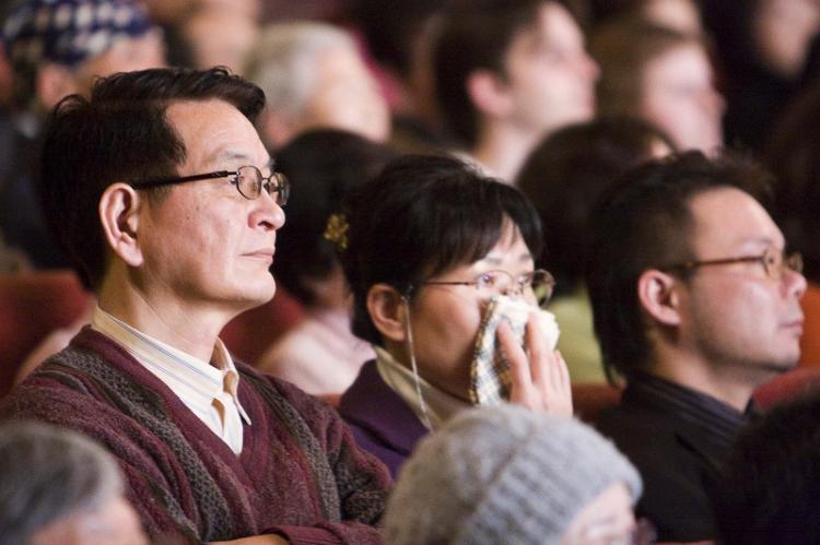 Some theatergoers are touched to tears while watching Divine Performing Arts in Nagoya. (Ming Li/The Epoch Times)
