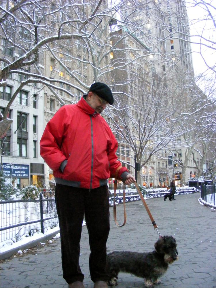 Mr. Enrico Ferorelli walking his dog Mimi through Madison Square Park. (The Epoch Times)