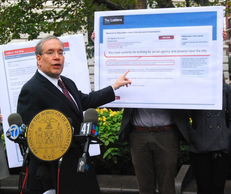 Manhattan Borough President Scott Stringer refers to the results of his office's investigation, showing that more often than not companies are using good credit as a prerequisite for hiring.  (Catherine Yang/The Epoch Times)