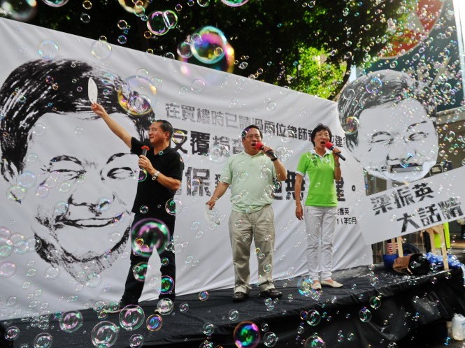 Protesters call Hong Kong's new executive chief Leung Chun-ying a liar,